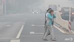 Dân Trung Quốc 'bất lực' chìm trong sương mù ô nhiễm,